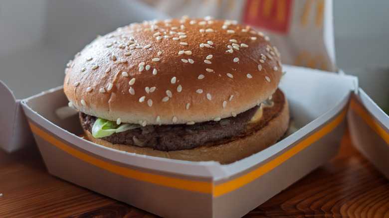 A McDonald's hamburger inside its box