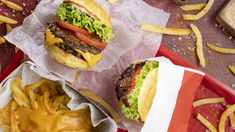 A messy fast food meal shot from above