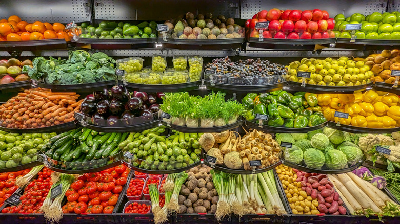 Grocery store produce section refrigerated shelves