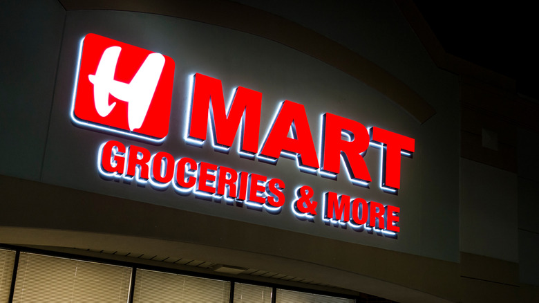 Exterior of an H Mart, night