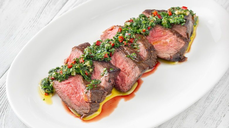 Steak covered in chimichurri