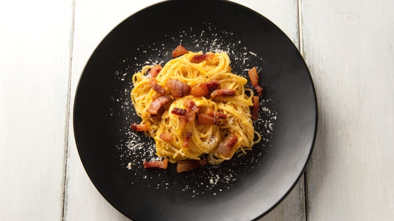 A plate of spaghetti carbonara, a not-so-traditional Italian dish