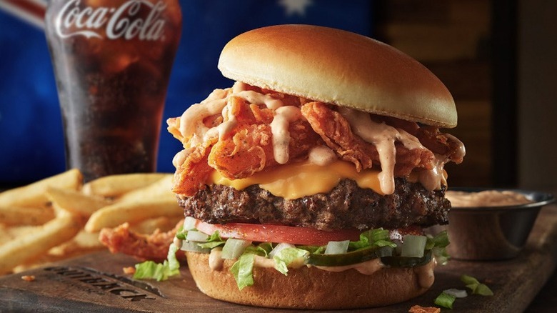 Outback Steakhouse Bloomin' Burger with fries and a Coke