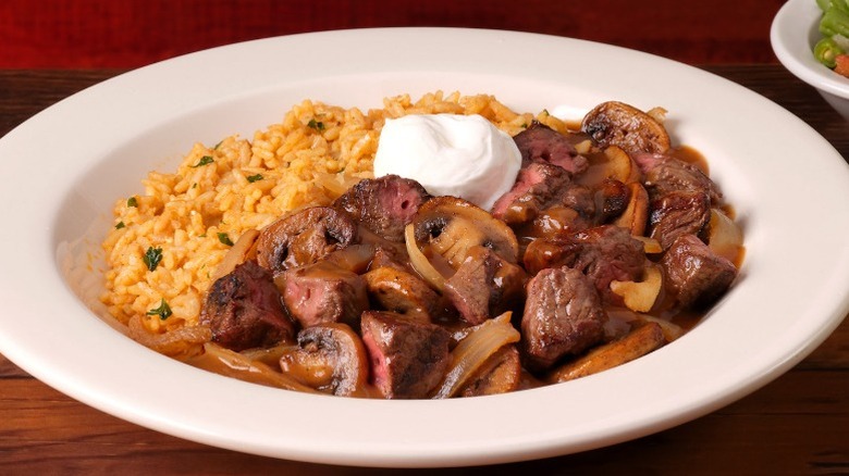 Texas Roadhouse beef tips with seasoned rice