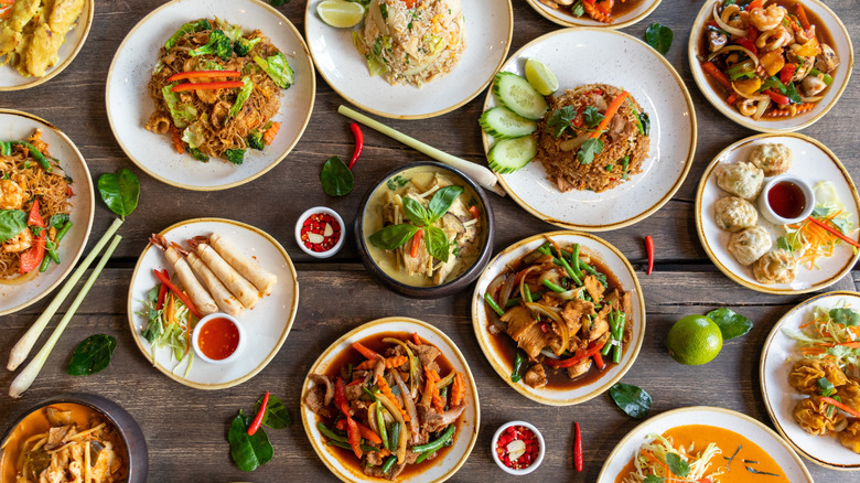 Selection of different Thai dishes on a table