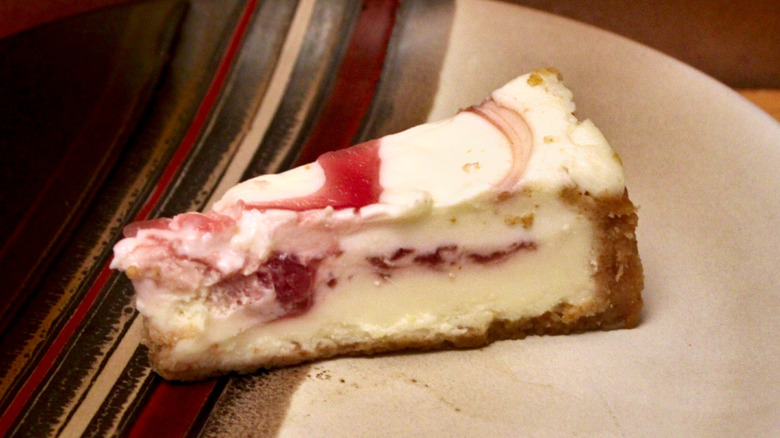 A Great Value brand slice of Strawberry Cheesecake
