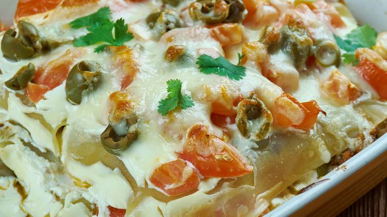 Closeup of a Mexican-style lasagna in a pan