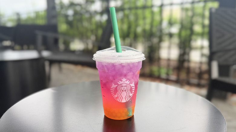 Starbucks Tropical Butterfly Refresher on a table in outdoor seating area
