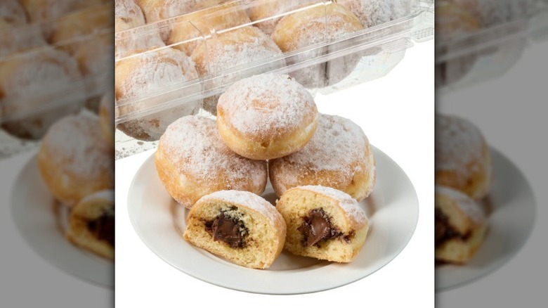 A product image of Costco's Mini Beignets Filled with Chocolate Hazelnut on a white background.