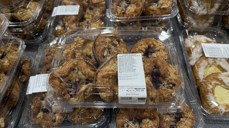 Caramelized Blueberry Cheesecake Croissant sitting with other pastries