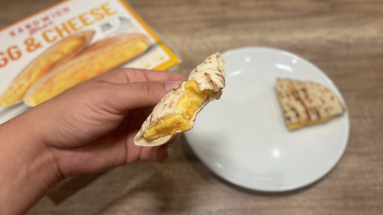 eating pita sandwich