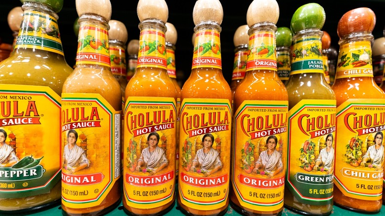 Various flavors of Cholula hot sauce