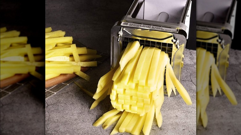 Potatoes cut into strips using an electric fry cutter