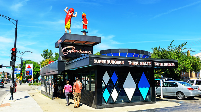 superdawg exterior with statues on top of building