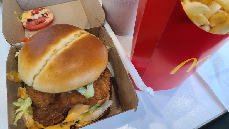 Spicy McCrispy in McDonald's container next to fries