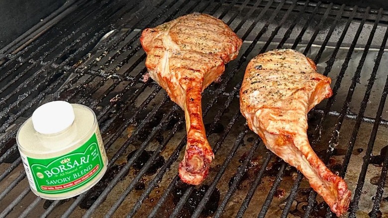 tomahawk steaks on a grill with Borsari savory blend
