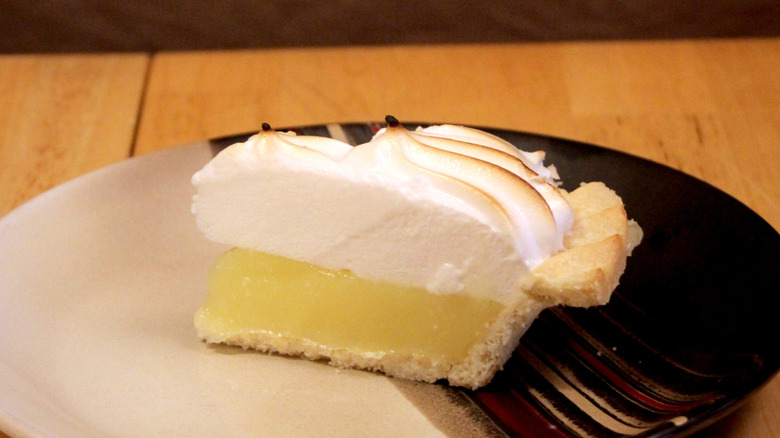 A slice of Market Basket Lemon Meringue Pie on plate