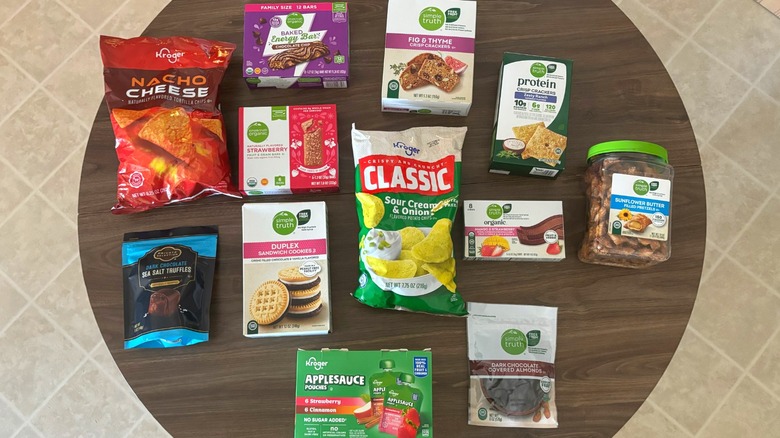Kroger branded snacks on round wooden table
