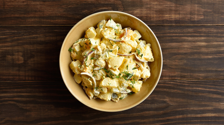Bowl of potato salad on a table