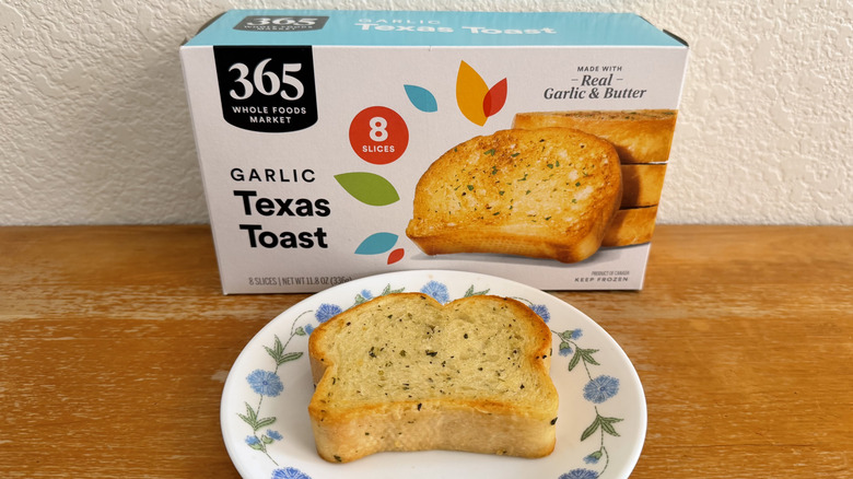 Whole Foods Texas toast slice on a small plate in front of its box