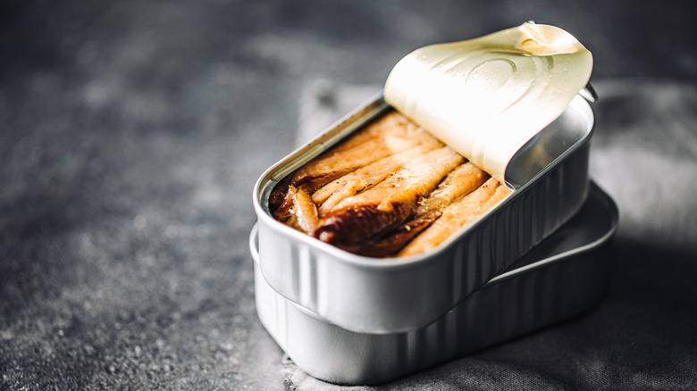 Opened canned sardine on the kitchen table