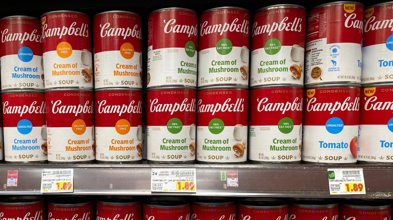 Campbell's soup cans on a supermarket shelf