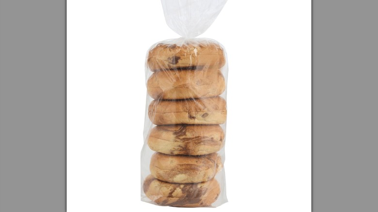 A plastic bag full of six French Toast Bagels from Sam's Club on a white background
