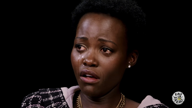 Lupita Nyong'o crying during her episode of "Hot Ones"