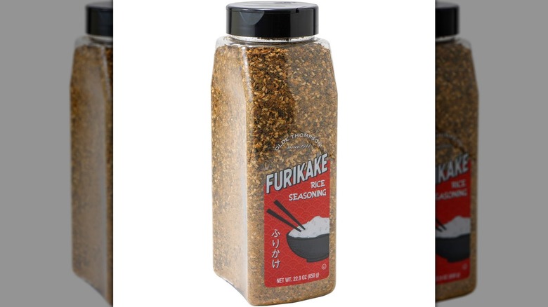 large plastic jar of rice seasoning