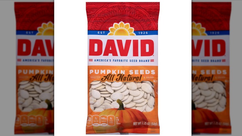 A product image of David Seeds Salted and Roasted Pumpkin Seeds on a white background.
