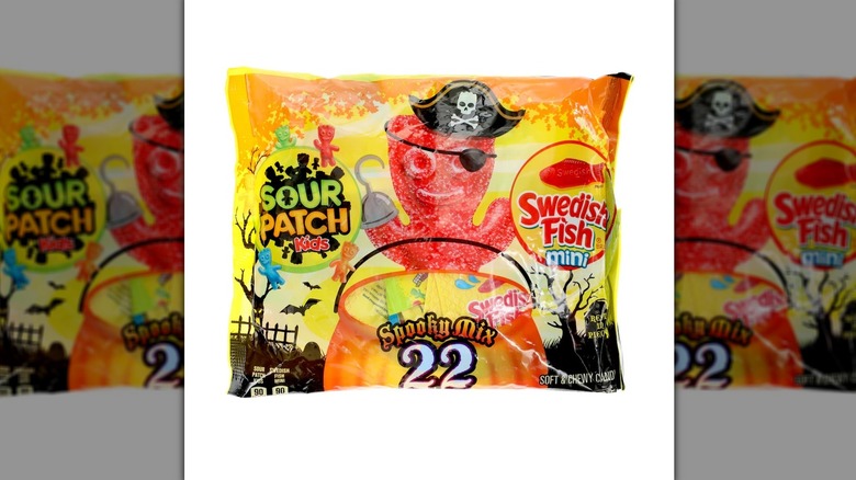 A product image of Sour Patch Kids Swedish Fish Mini Soft And Chewy Candy on a white background.