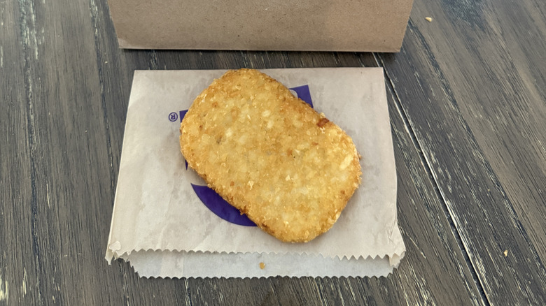 Taco Bell hash brown on its wrapper