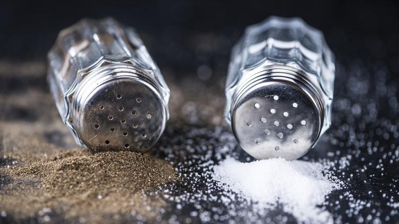 Salt and pepper shakers tipped over