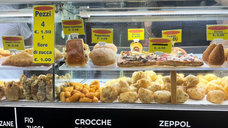 stand with Italian streetfoods, pizza panino aranchini hot dog zeppoli