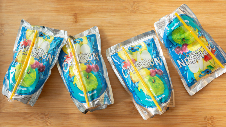 Multiple packs of Capri Sun pacific cooler on a table