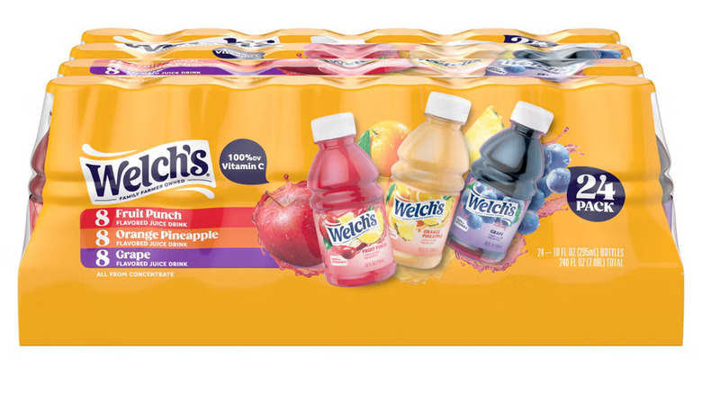 A case of Welch's Juice bottle variety pack wrapped in yellow packaging on a white background