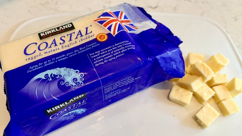 Cubes cut from a block of Costco Kirkland Signature Coastal English Cheddar cheese