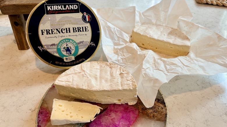 A cut wheel of Kirkland Signature imported French Brie from Costco