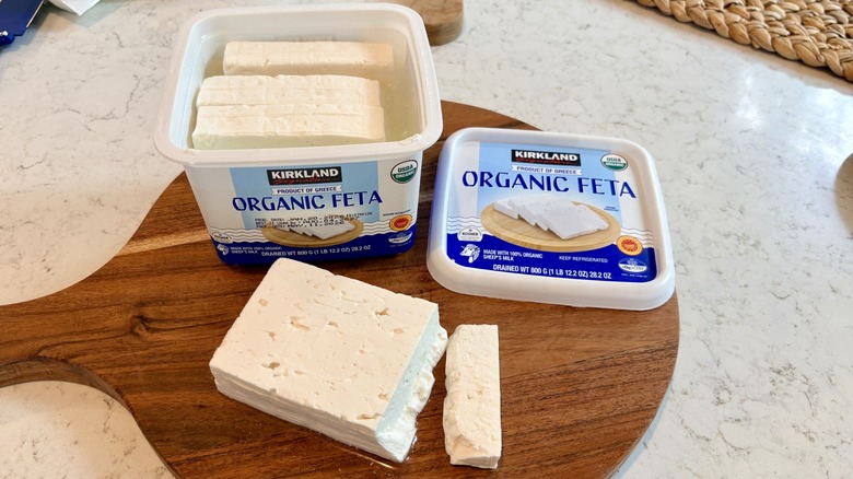 An opened tub of Kirkland Signature organic feta from Costco