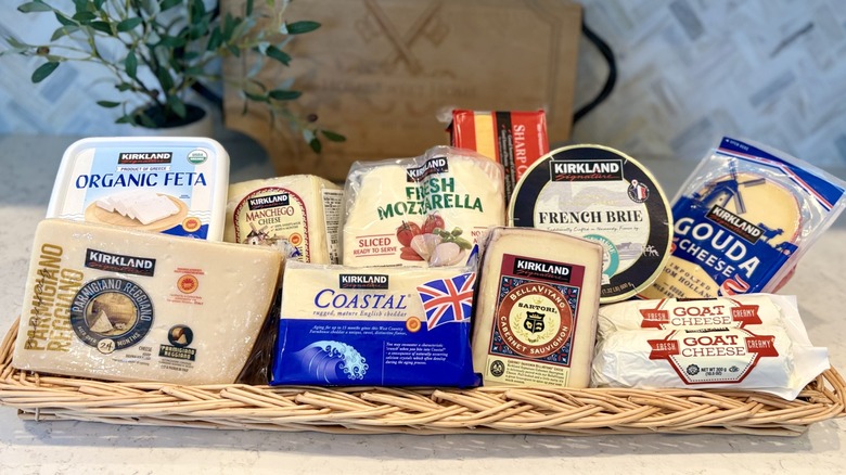 A basket tray filled with an assortment of Costco Kirkland Signature cheese varieties