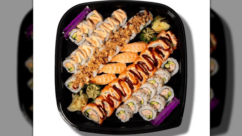 The 44 sushi rolls in the Member's Mark by FujiSan Akita Sushi Roll Party Tray from Sam's Club on a white background.