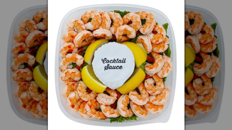 The Member's Mark Shrimp Tray with Cocktail Sauce from Sam's Club on a white background.