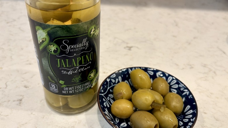 A closeup of Specially Selected jalapeño stuffed olives from Aldi