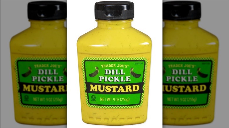 Bottle of Trader Joe's Dill Pickle Mustard on white background