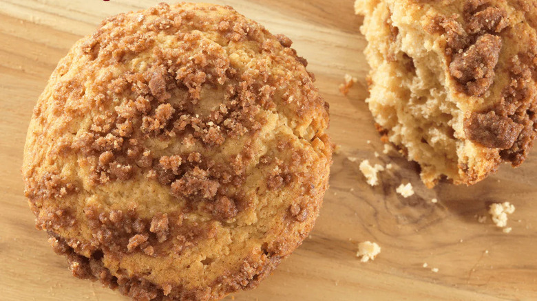 Crumbly muffins on a wood top