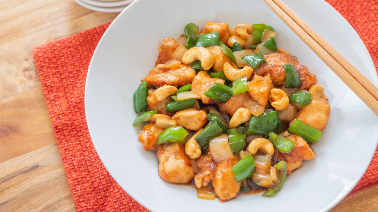 White plate of cashew chicken