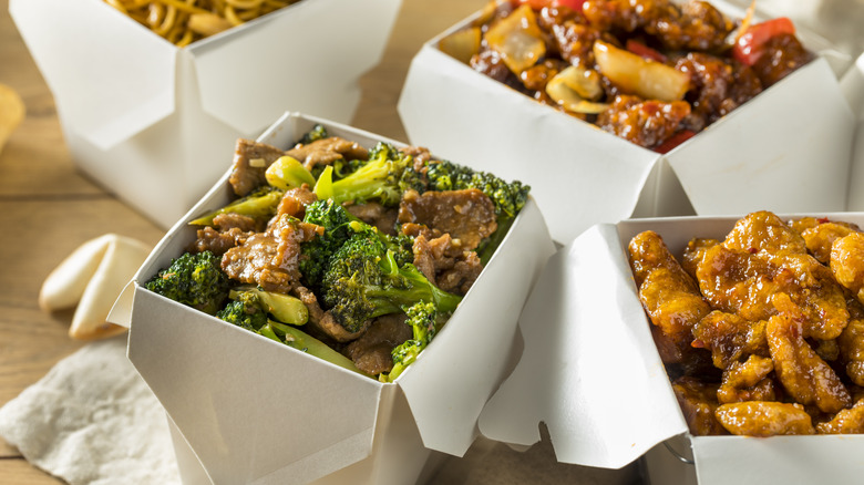 Chinese takeout in white boxes