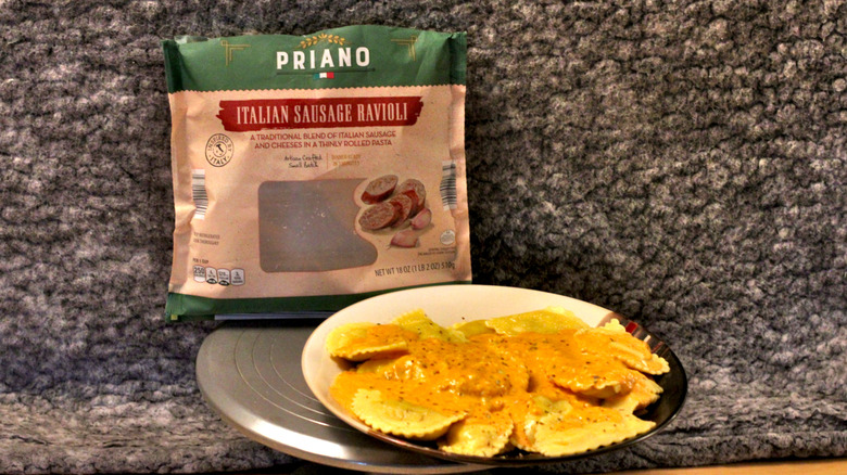 A plate of Priano brand Italian sausage stuffed ravioli in a homemade red pepper and asiago cream sauce
