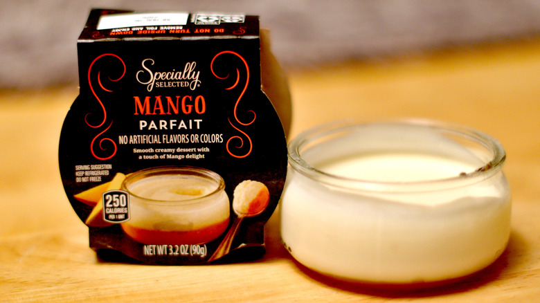 A little jar of Specially Selected brand mango parfait next to packaging