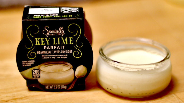 A small glass jar of Specially Selected brand key lime parfait next to packaging